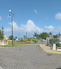 Immeuble de bureaux à Baie-Mahault, Guadeloupe, en liquidation judiciaire, cession encadrée, bâtiment moderne et commercial.